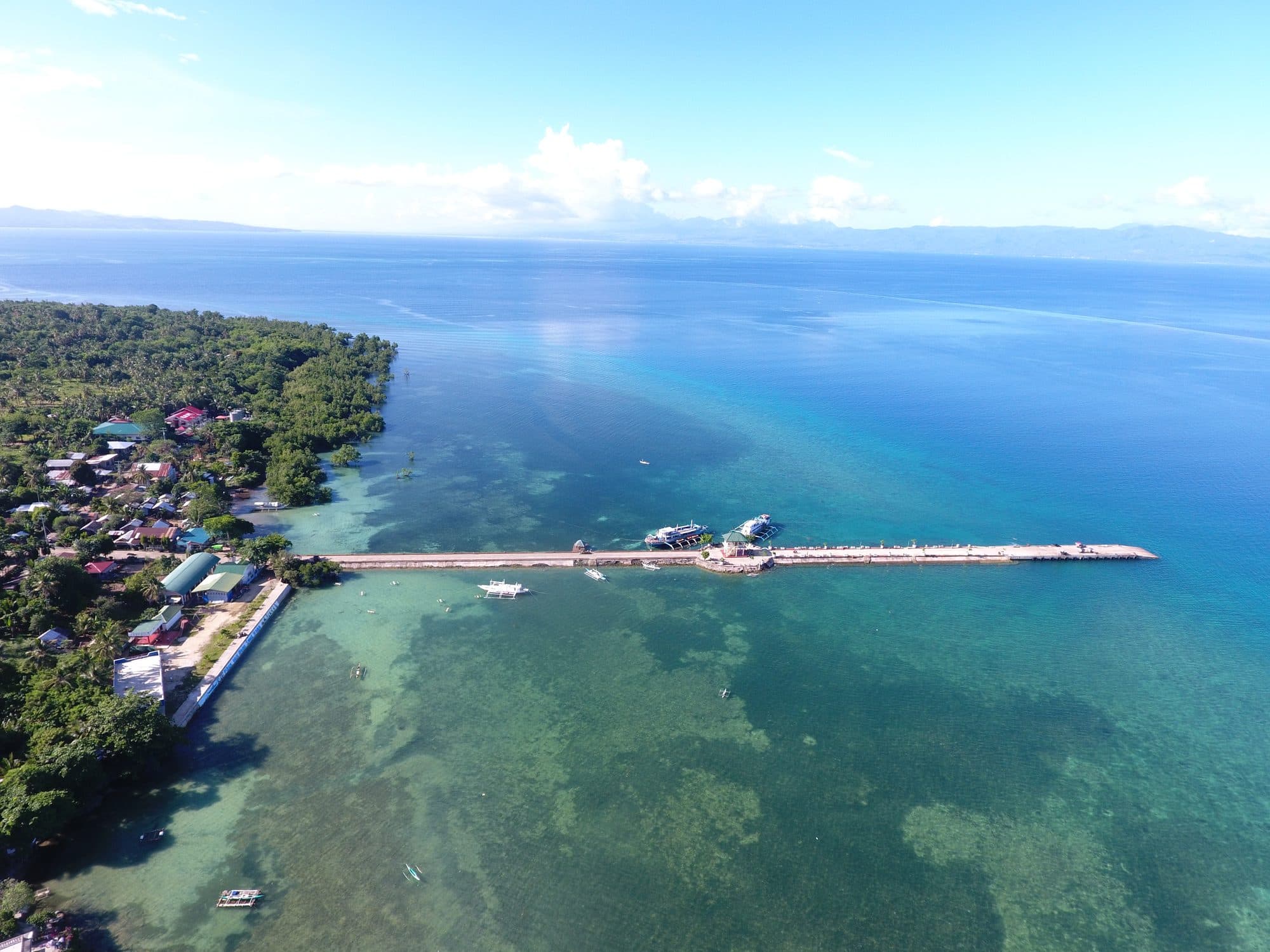 The town of Pilar and its long pier from the air